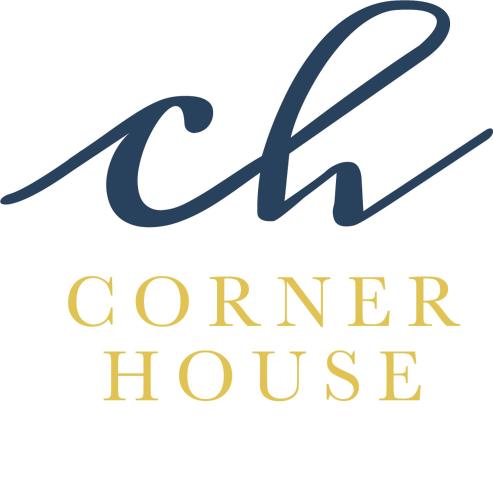 a logo for a computer house at The Corner House Hotel in Annan
