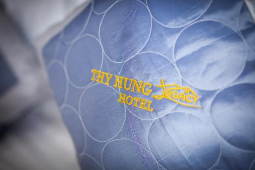 a close up of a drawing of a blue flower at Thy Hung legacy hotel in Tuy Hoa