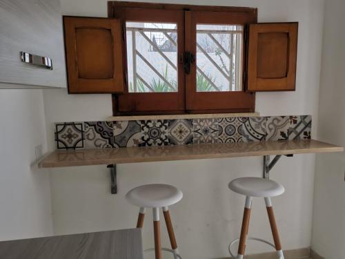 Kuchyň nebo kuchyňský kout v ubytování Villetta Vivaldi 2