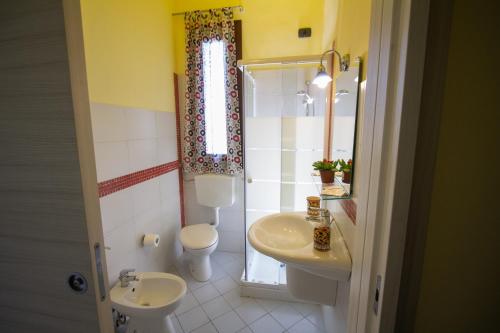 Koupelna v ubytování Hotel Merlino