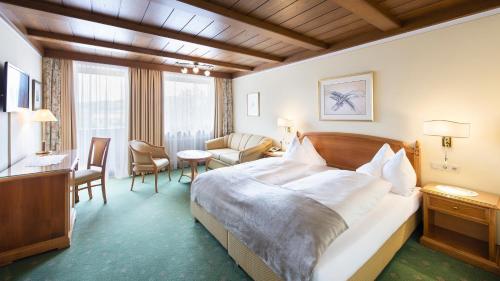 Кровать или кровати в номере Hotel Landgasthof Altwirt