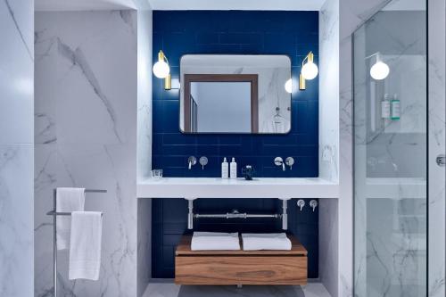 Koupelna v ubytování Helen Berger Boutique Hotel