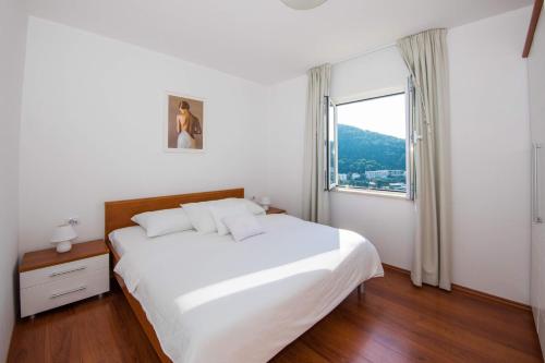 Ένα ή περισσότερα κρεβάτια σε δωμάτιο στο Apartment Vista 2