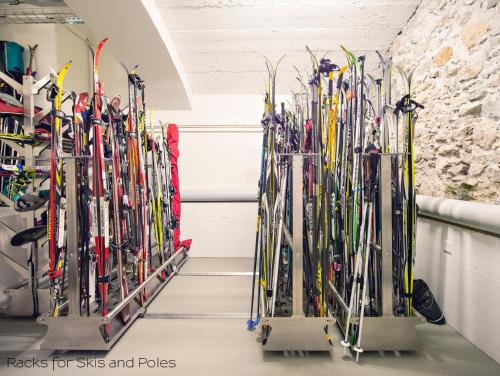 a bunch of skis are lined up in a rack at Sporthotel Pontresina in Pontresina