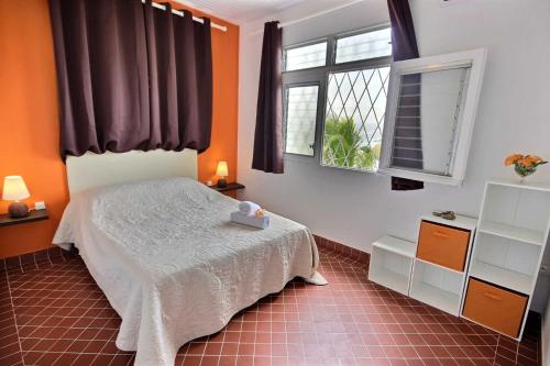 Llit o llits en una habitació de Villa Cécia