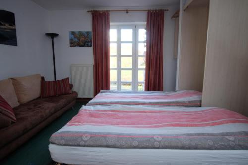 Katil atau katil-katil dalam bilik di Strand-Appartement "Sanddornstübchen"