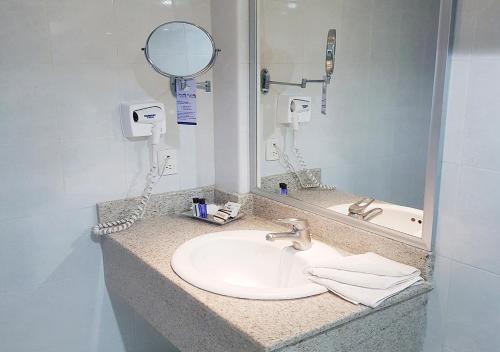 Koupelna v ubytování Hotel Ciros