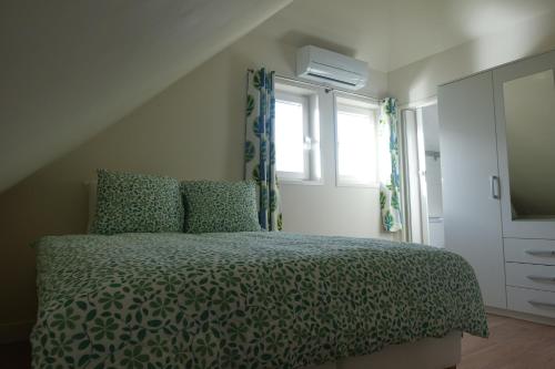 Posteľ alebo postele v izbe v ubytovaní Water & Meadow cottage in Central Holland 2A & 2C