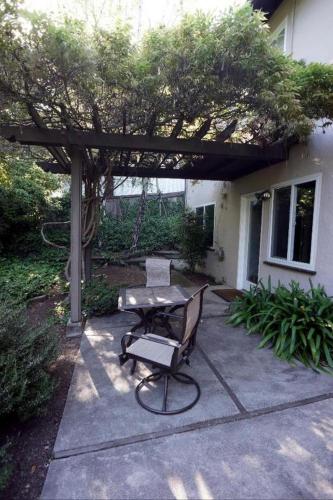 a picnic table and a bench on a patio at Large 1 Bedroom Apartment, Home Theater, Fireplace in Berkeley