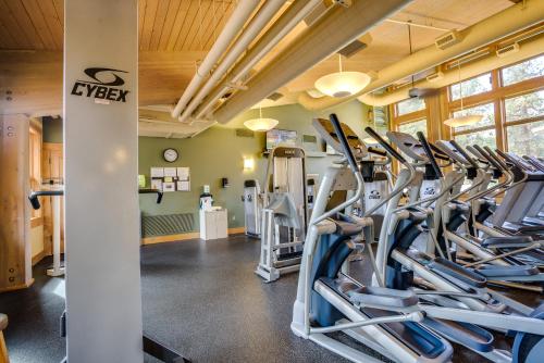 a gym with treadmills and elliptical machines at Meadows Edge Cabin in Black Butte Ranch