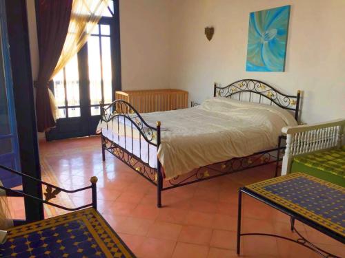 Ліжко або ліжка в номері Villa Jardins de la Lagune
