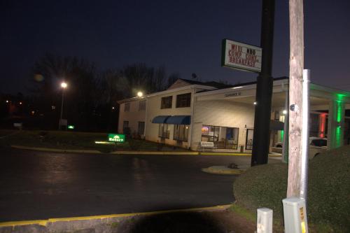 a building with a sign on the side of a street at Bestway Inn in Rock Hill