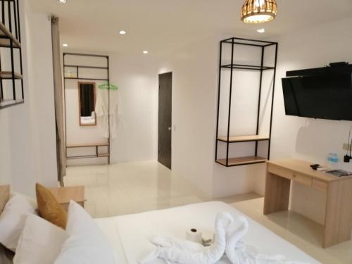 Postel nebo postele na pokoji v ubytování Hotel Rupert A Baler