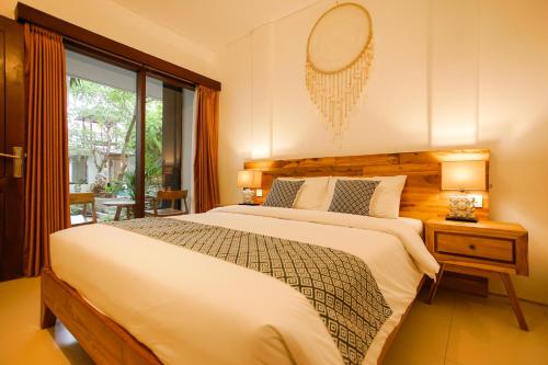 Cama o camas de una habitación en The Kubu Hotel