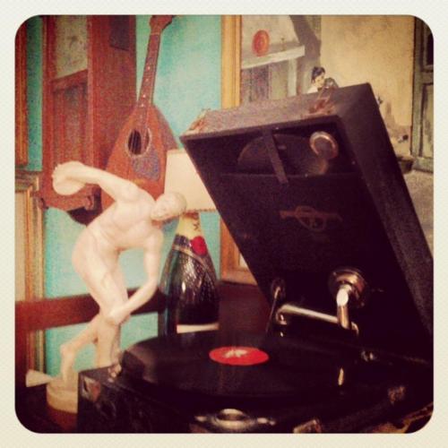 a statue of a man standing on top of a stove at Art B&B La Casa del Pittore in Revine Lago