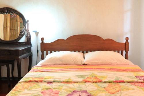 Cama o camas de una habitación en Sunarta House Homestay
