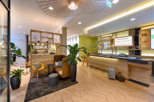 Kuchyň nebo kuchyňský kout v ubytování Ibis Styles Aschaffenburg