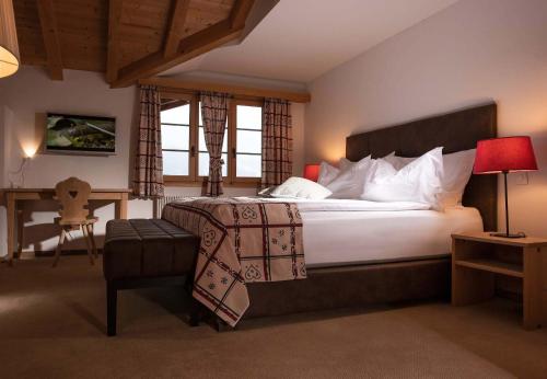 מיטה או מיטות בחדר ב-Hotel Kernen