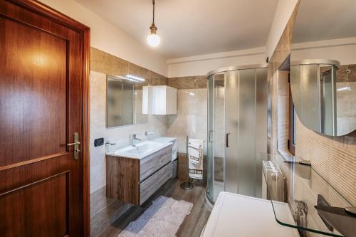 a bathroom with a sink and a shower at B&B Matilde in Mormanno