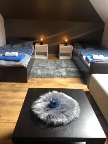 Posteľ alebo postele v izbe v ubytovaní Apartamenty Maria