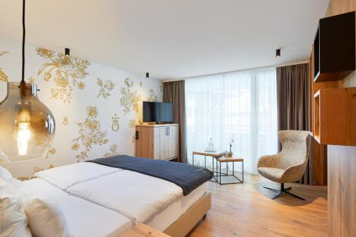 TV a/nebo společenská místnost v ubytování die HOCHKÖNIGIN - Mountain Resort