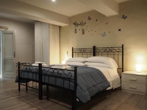 Katil atau katil-katil dalam bilik di Hotel Santa Croce