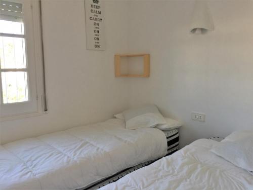 Postel nebo postele na pokoji v ubytování VALL PETITA 152