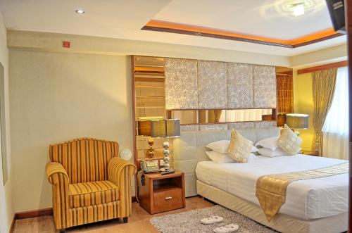 Postel nebo postele na pokoji v ubytování Clarence House Nairobi