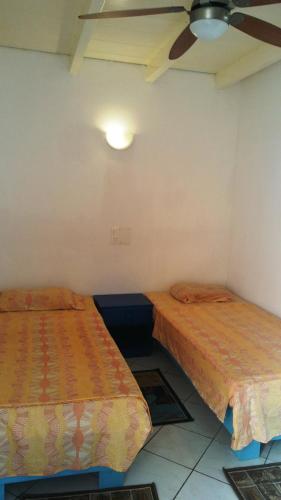 Krevet ili kreveti u jedinici u okviru objekta Hostels Holiday Cape Verde