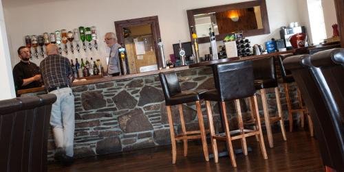 Lounge nebo bar v ubytování Tuckers Inn