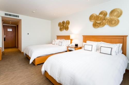 Postel nebo postele na pokoji v ubytování Hotel Melia Lima