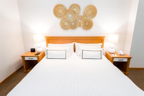Postel nebo postele na pokoji v ubytování Hotel Melia Lima