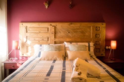 En eller flere senge i et værelse på Casa Rural Molí de Fòrnols