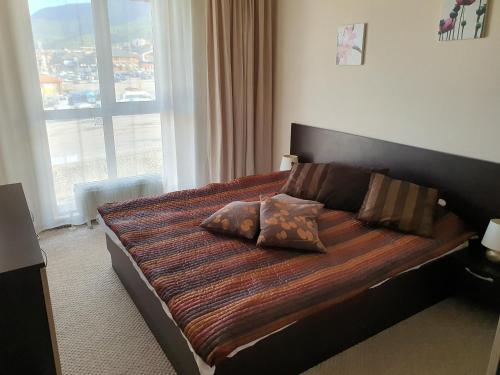 Кровать или кровати в номере Koko's apartments