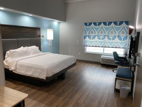 Кровать или кровати в номере Tru By Hilton Katy Houston West, Tx