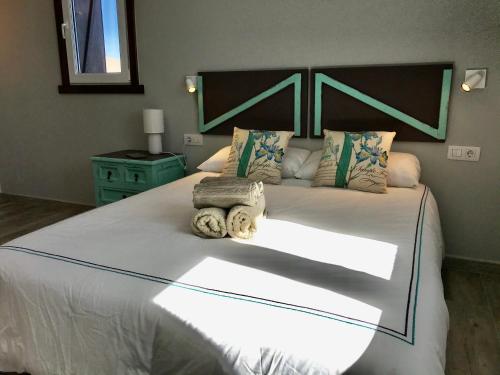 Tempat tidur dalam kamar di Eslanzarote Eco Country House, Star View Area, Super wifi, Barbecue