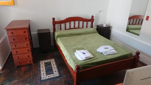 Ένα ή περισσότερα κρεβάτια σε δωμάτιο στο Apartamentos Quintana