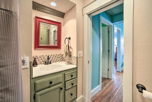 a bathroom with a sink and a mirror at Modern Home with Backyard, 1 Mi to Dtwn Sturgeon Bay in Sturgeon Bay