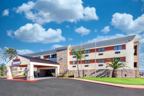 a rendering of the front of a hotel at Ramada by Wyndham Houston Intercontinental Airport South in Houston