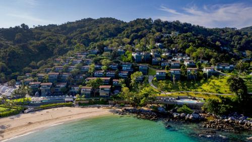 an aerial view of a resort on the beach at The Shore At Katathani - Adult Only - SHA Extra Plus in Kata Beach