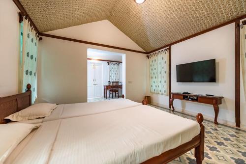 Postel nebo postele na pokoji v ubytování Balaram Palace Resort