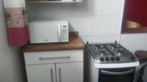 Una cocina o zona de cocina en Cabo Frio temporada praia