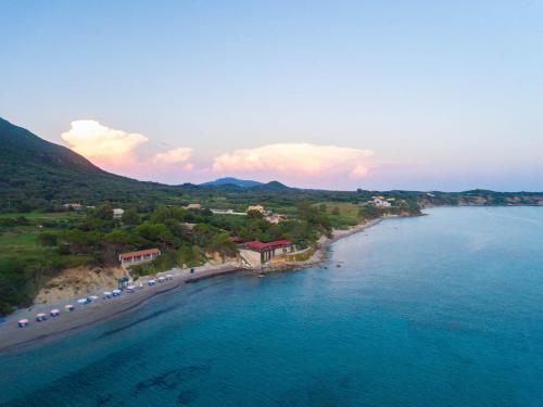an aerial view of a beach and the ocean at Christinas lofts in Ágios Matthaíos
