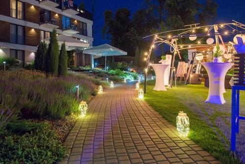 Κήπος έξω από το Hotel Uniejów