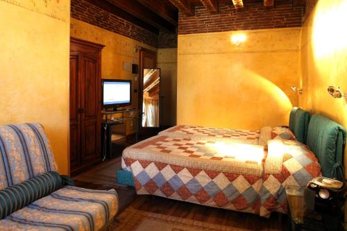 Tempat tidur dalam kamar di Hotel Tabina