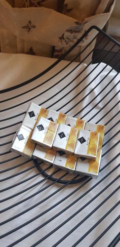 a group of cards sitting on top of a bed at Hotel Altberesinchen in Frankfurt/Oder