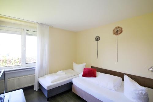 Postel nebo postele na pokoji v ubytování Hotel Kick