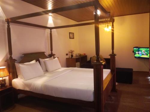 Ένα ή περισσότερα κρεβάτια σε δωμάτιο στο Cozy Homestay