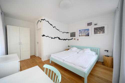 Posteľ alebo postele v izbe v ubytovaní Světoběžník Bed & Wine