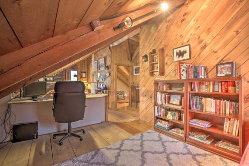 an office with a desk and a chair in a cabin at Cabin Private Hot Tub, Walk to Pats Peak Ski Area in Henniker